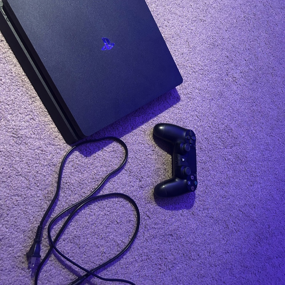 Sony PlayStation Console with Black Controller